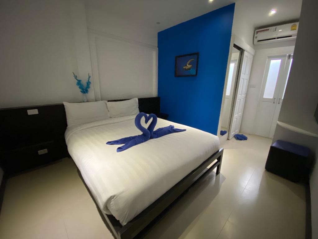 Postel nebo postele na pokoji v ubytování Colorize Boutique Hotel