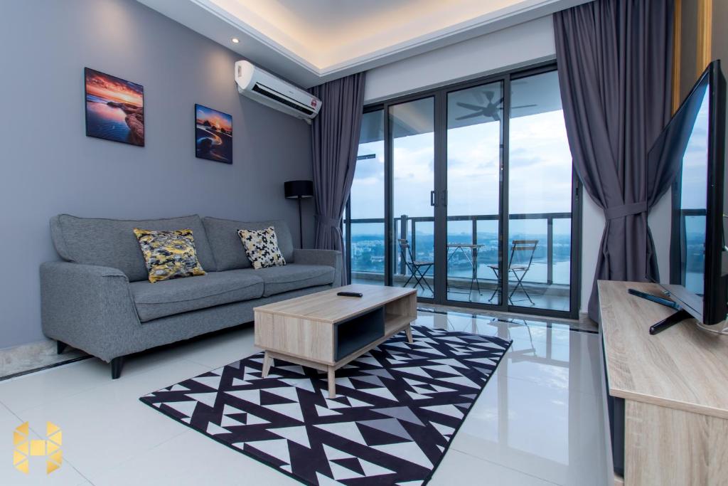 Ruang duduk di R&F Princess Cove CIQ Premium Sea View Suites by NEO