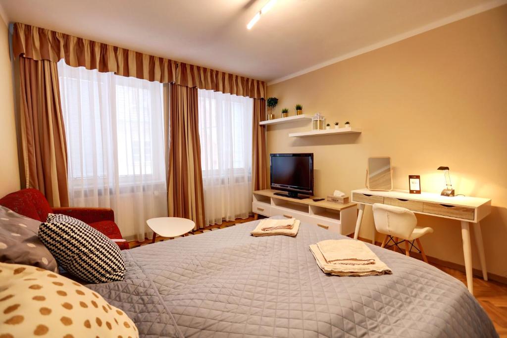 Posteľ alebo postele v izbe v ubytovaní Old Town Apartment