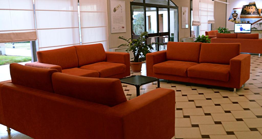 Posezení v ubytování Heraclea Hotel Residence