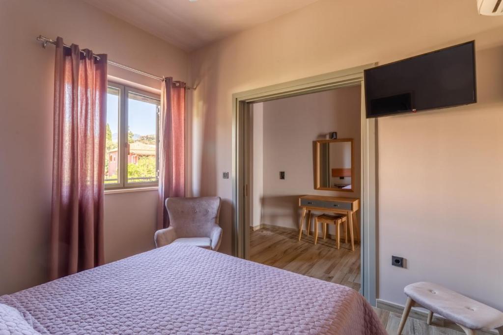 TV a/nebo společenská místnost v ubytování Sophia's Beach House