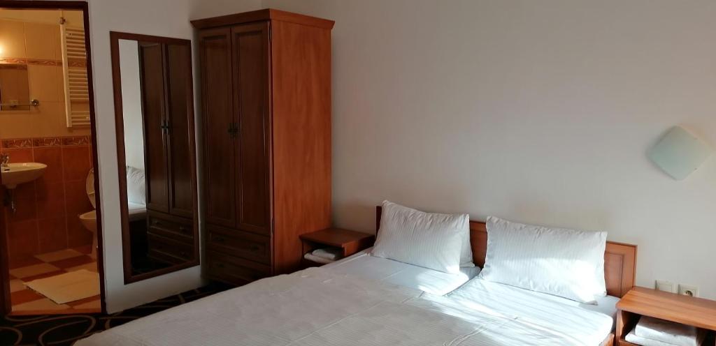Postel nebo postele na pokoji v ubytování Pension Magnolia
