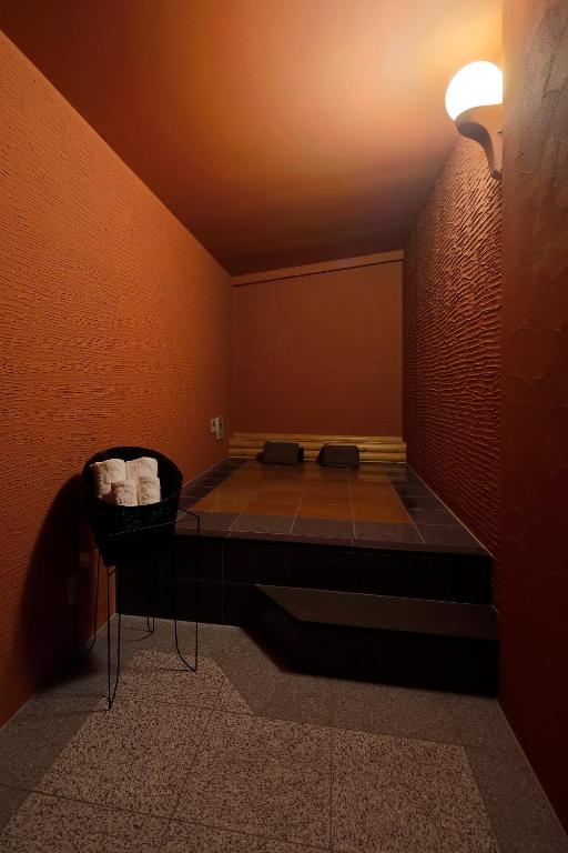 Postel nebo postele na pokoji v ubytování HOTEL Birthday 楠店