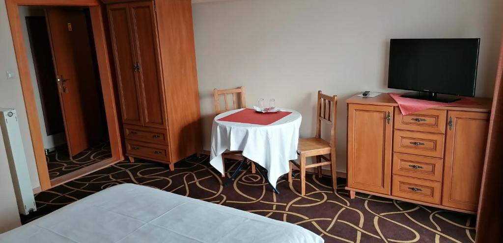 TV a/nebo společenská místnost v ubytování Pension Magnolia