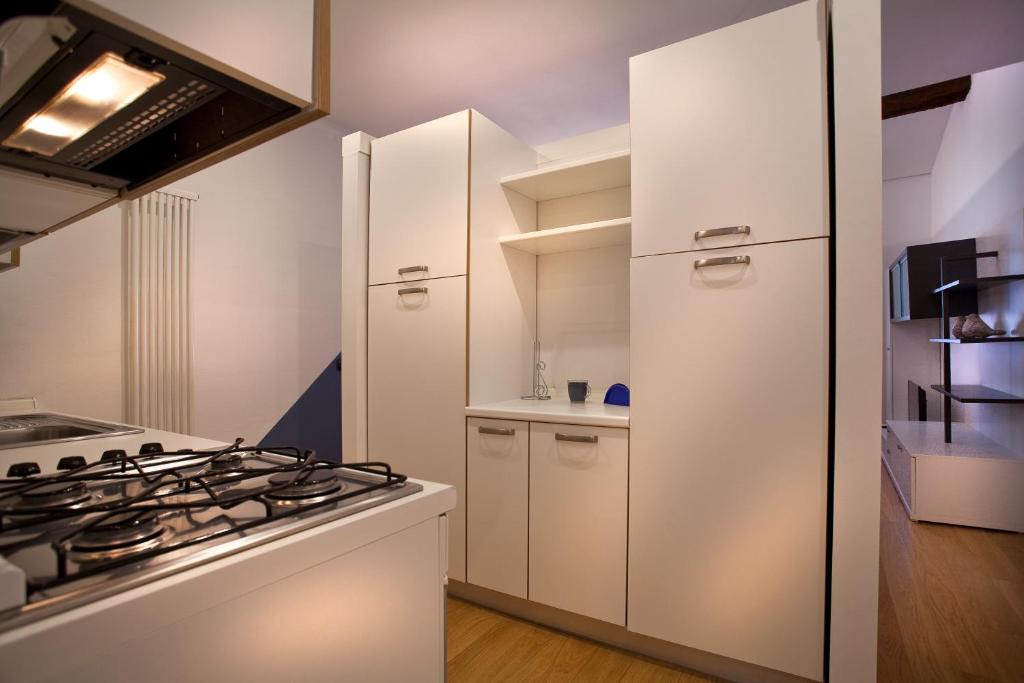 Cucina o angolo cottura di FILARMONICO SUITES
