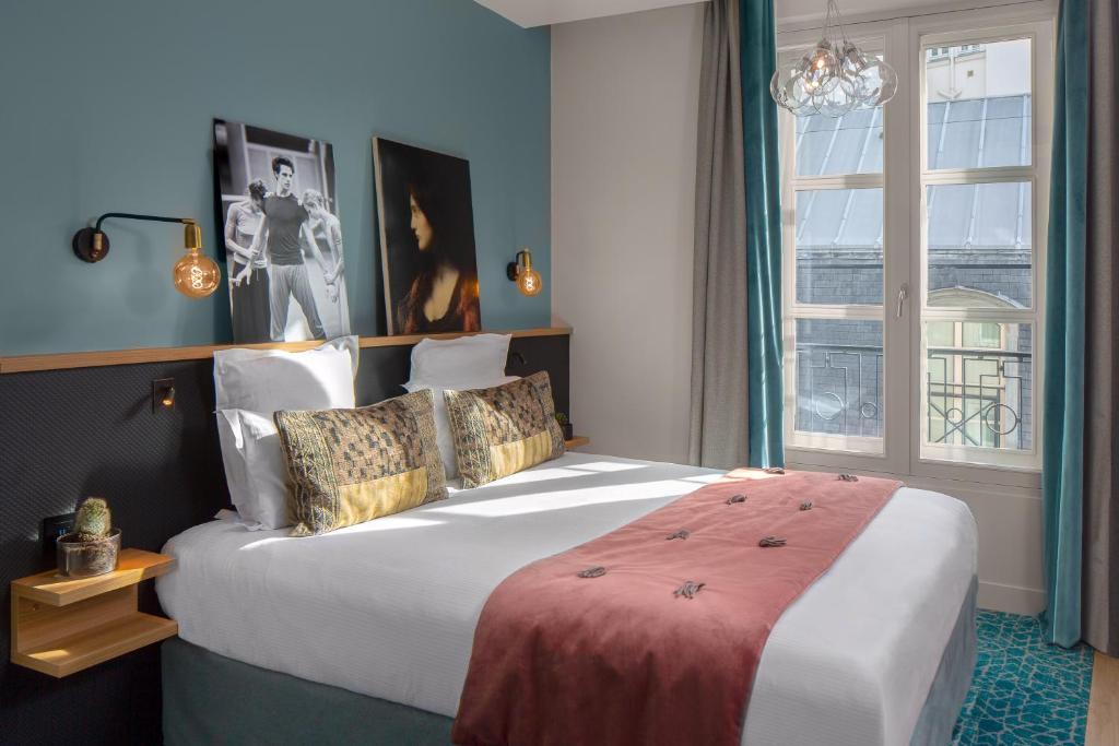 Lyric Hotel Paris Opera客房内的一张或多张床位