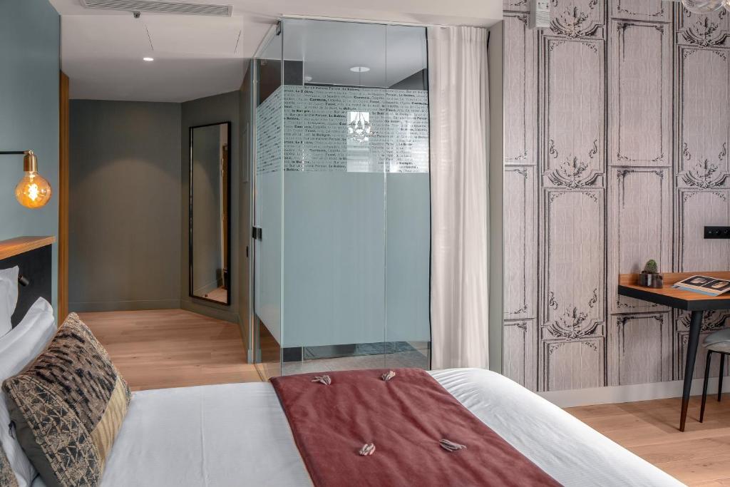 Lyric Hotel Paris Opera客房内的一张或多张床位