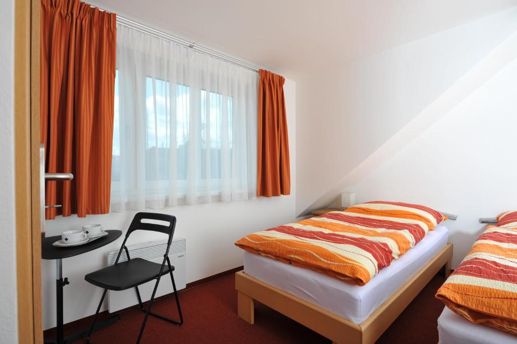 Postel nebo postele na pokoji v ubytování Habitat 16