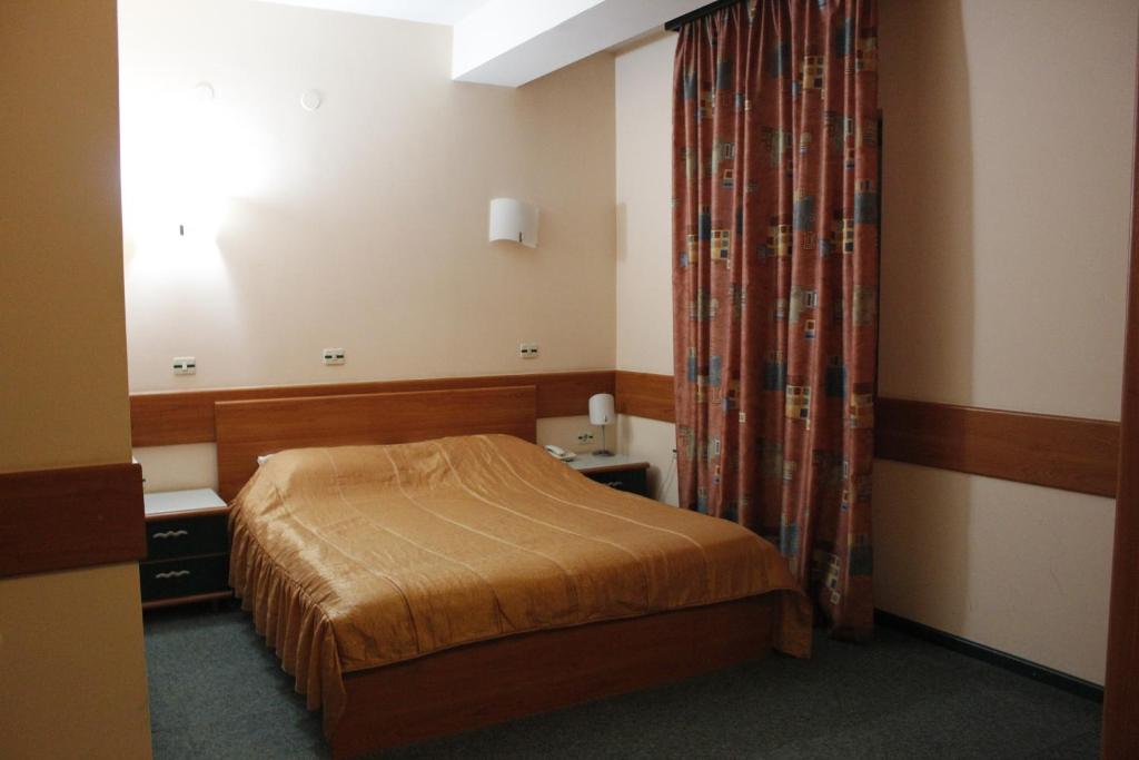 Postel nebo postele na pokoji v ubytování Hotel Cingo
