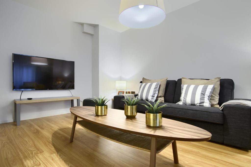 TV a/nebo společenská místnost v ubytování La Casa Gris