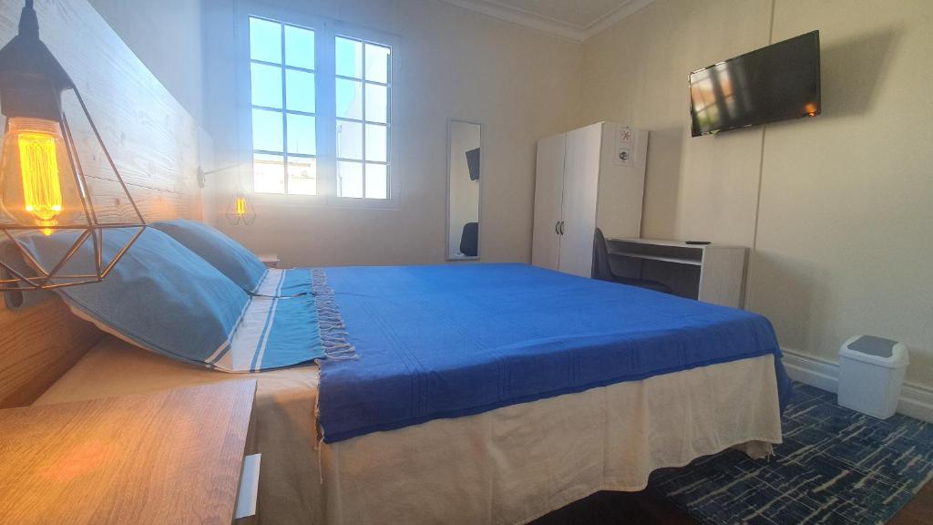 Postel nebo postele na pokoji v ubytování BRUMA HOSTEL