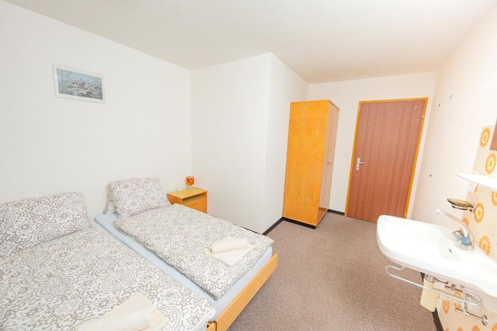 Postel nebo postele na pokoji v ubytování Haus Boccalino