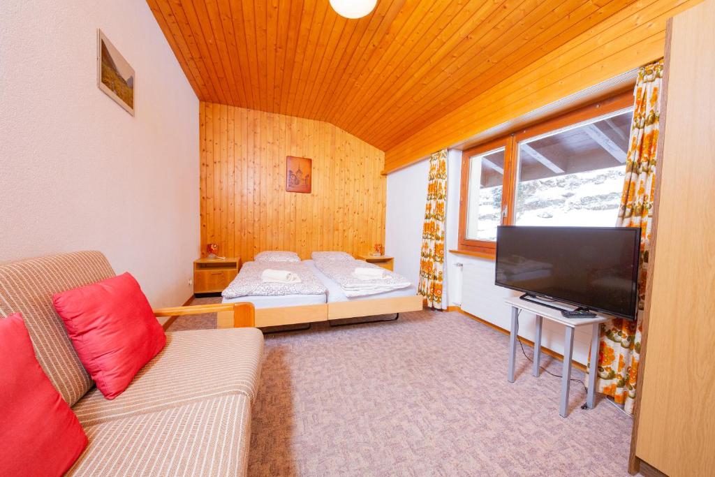 Postel nebo postele na pokoji v ubytování Haus Boccalino