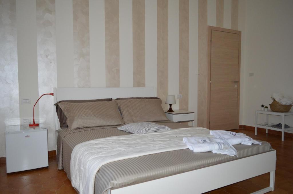 Posteľ alebo postele v izbe v ubytovaní White beach Le Castella