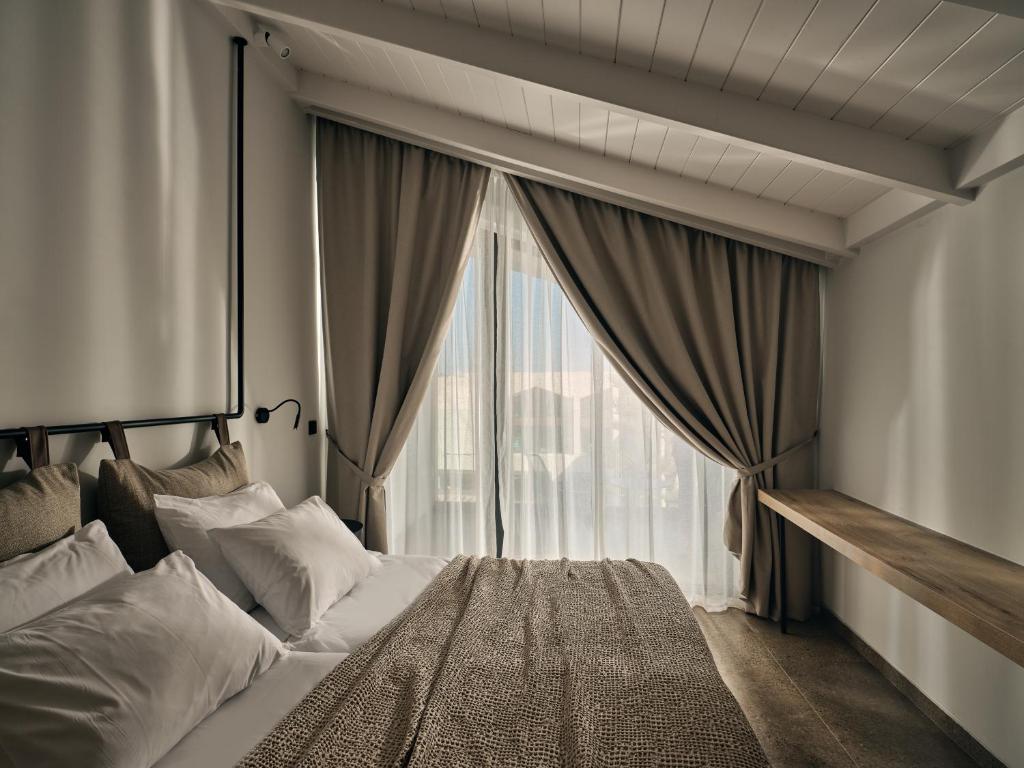 Letto o letti in una camera di Contessina Hotel
