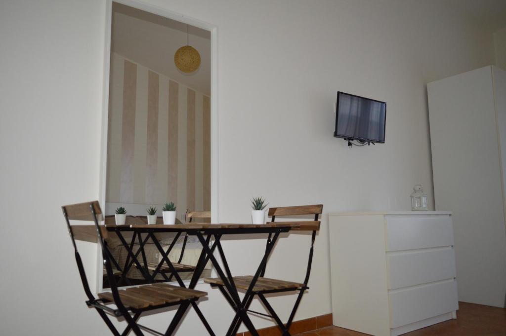 Televízia a/alebo spoločenská miestnosť v ubytovaní White beach Le Castella