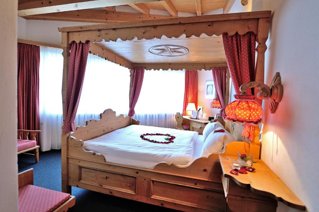 Postel nebo postele na pokoji v ubytování Hotel Sommerau