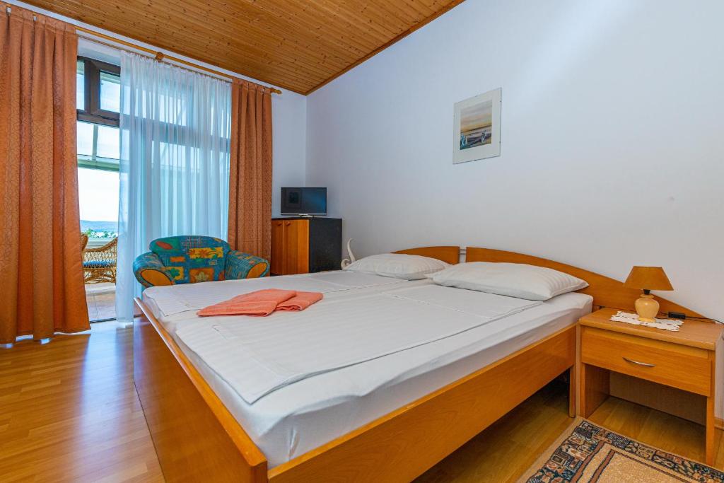 Postel nebo postele na pokoji v ubytování Vacattio apartment 2