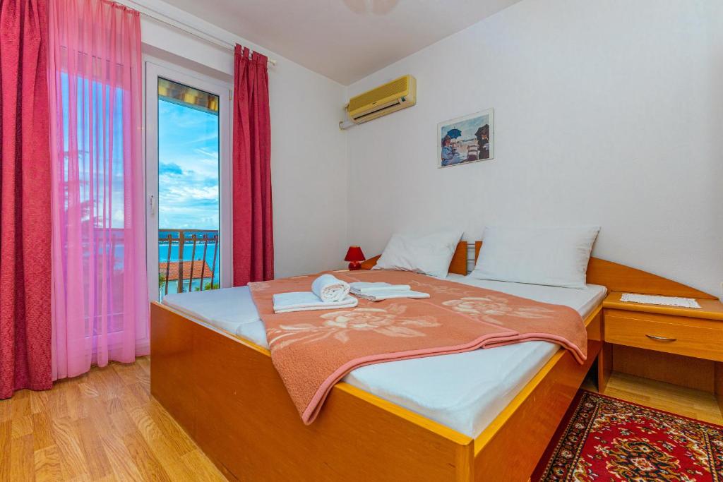 Postel nebo postele na pokoji v ubytování Vacattio apartment 2