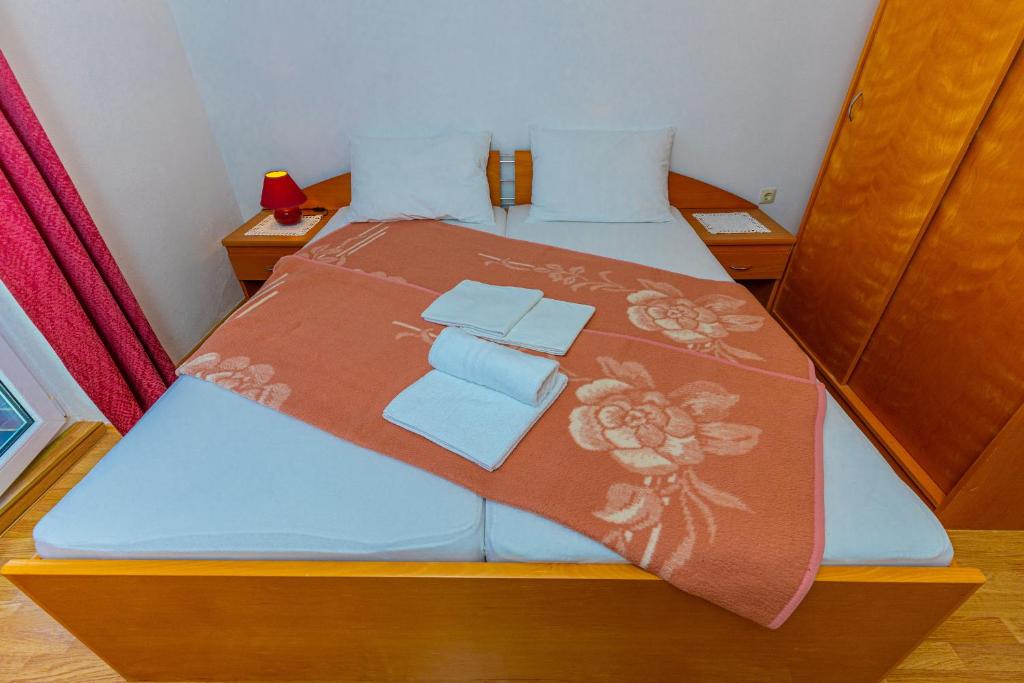 Postel nebo postele na pokoji v ubytování Vacattio apartment 2