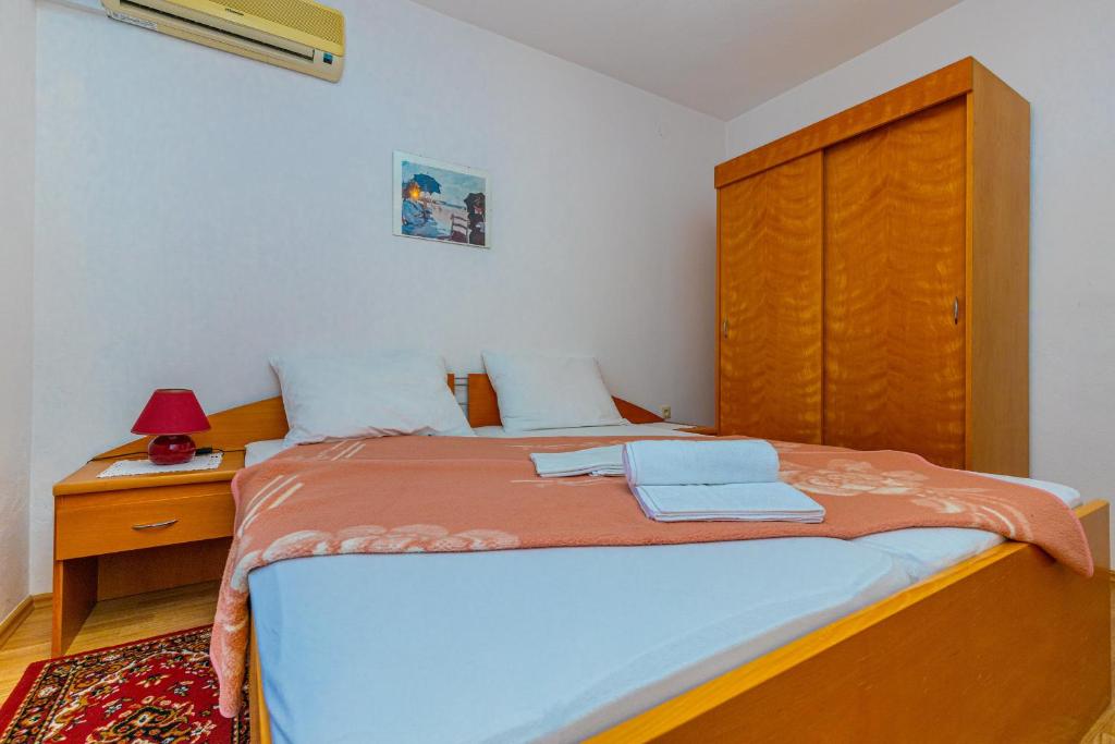 Postel nebo postele na pokoji v ubytování Vacattio apartment 2