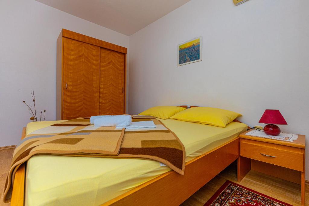 Postel nebo postele na pokoji v ubytování Vacattio apartment 2