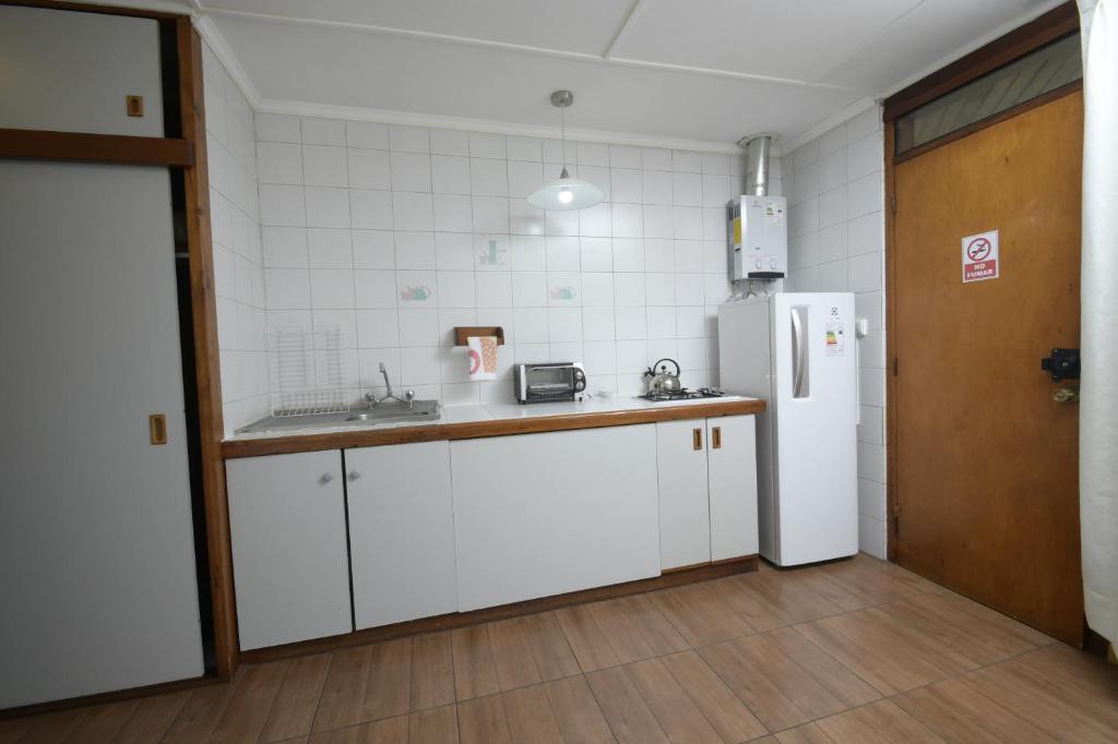 Kuchyň nebo kuchyňský kout v ubytování Dptos Castelar