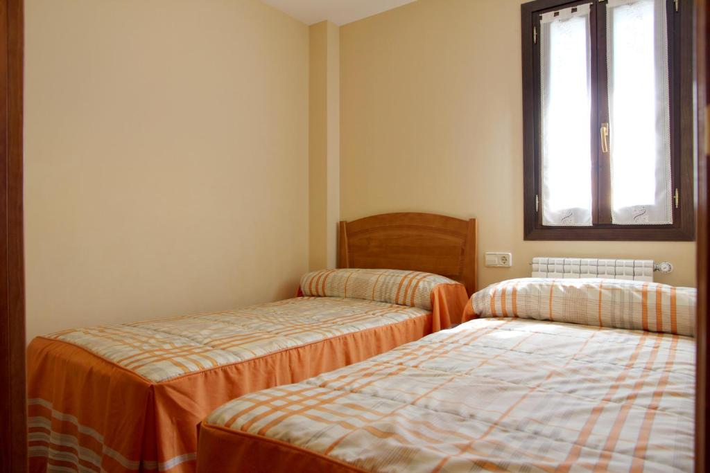 Postel nebo postele na pokoji v ubytování Casa Los Huertos
