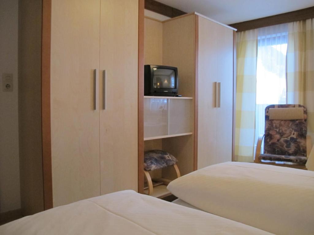 Postel nebo postele na pokoji v ubytování Pension und Appartement Weinschreiber
