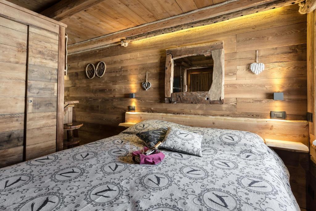 Postel nebo postele na pokoji v ubytování Brieis Relais Alpino