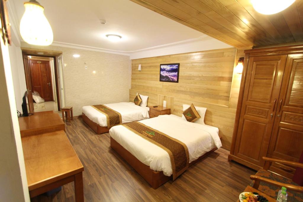Postel nebo postele na pokoji v ubytování Himalaya Sapa Hostel