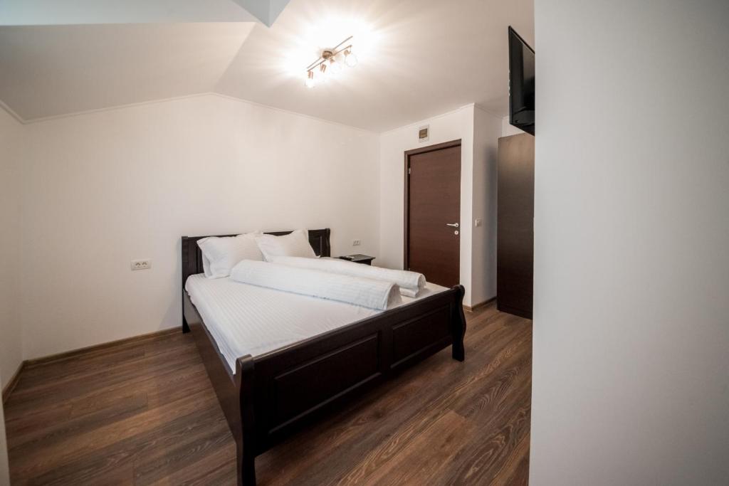 Postel nebo postele na pokoji v ubytování Dr House