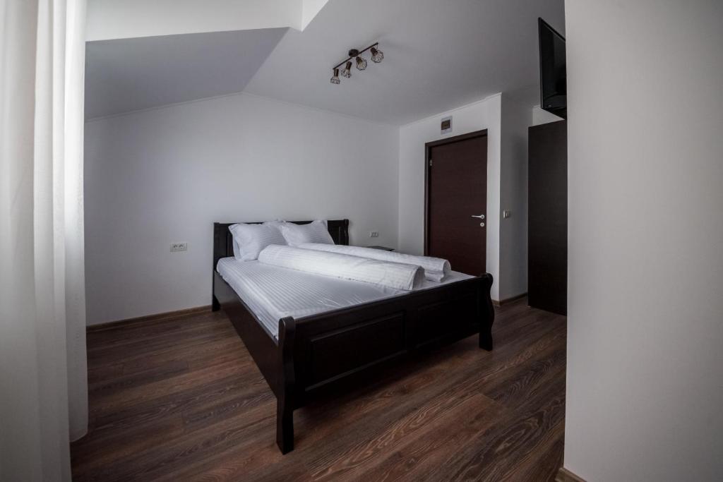Postel nebo postele na pokoji v ubytování Dr House