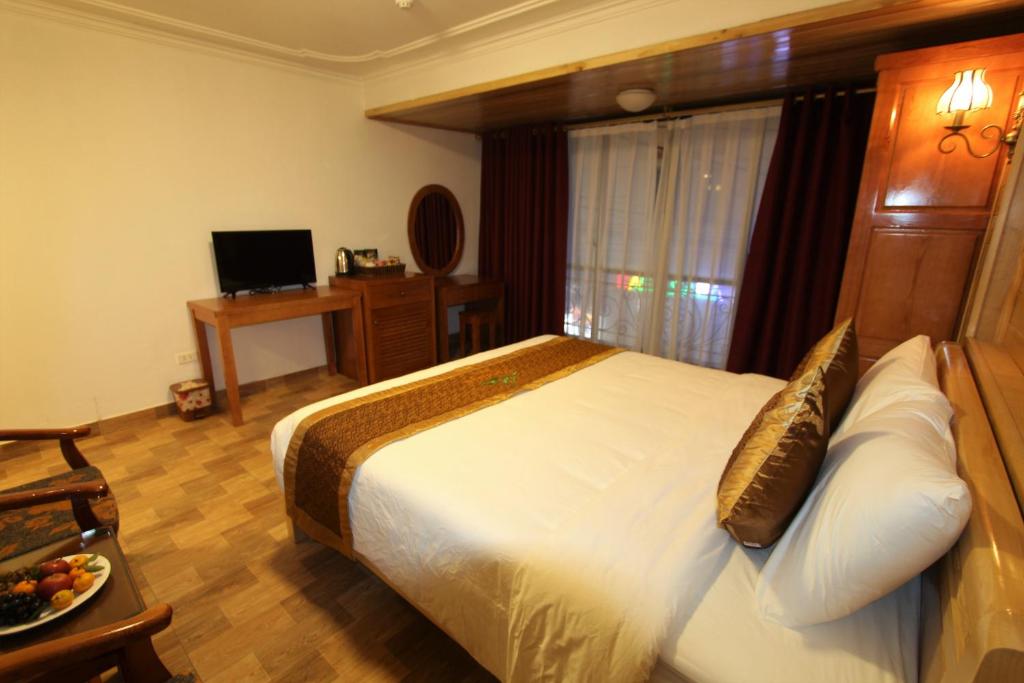 TV a/nebo společenská místnost v ubytování Himalaya Sapa Hostel
