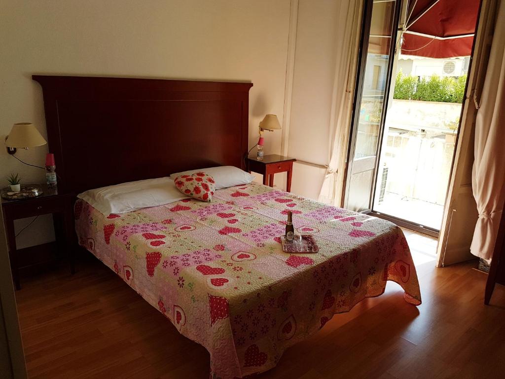 Postel nebo postele na pokoji v ubytování Bed & Breakfast Macallè