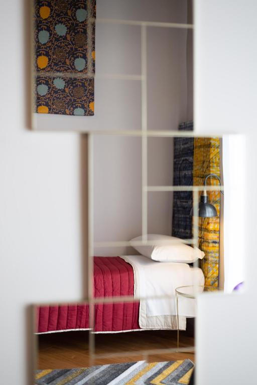 Letto o letti in una camera di Design Apartment Next Sorbillo on Tribunali St By HouseinNaples