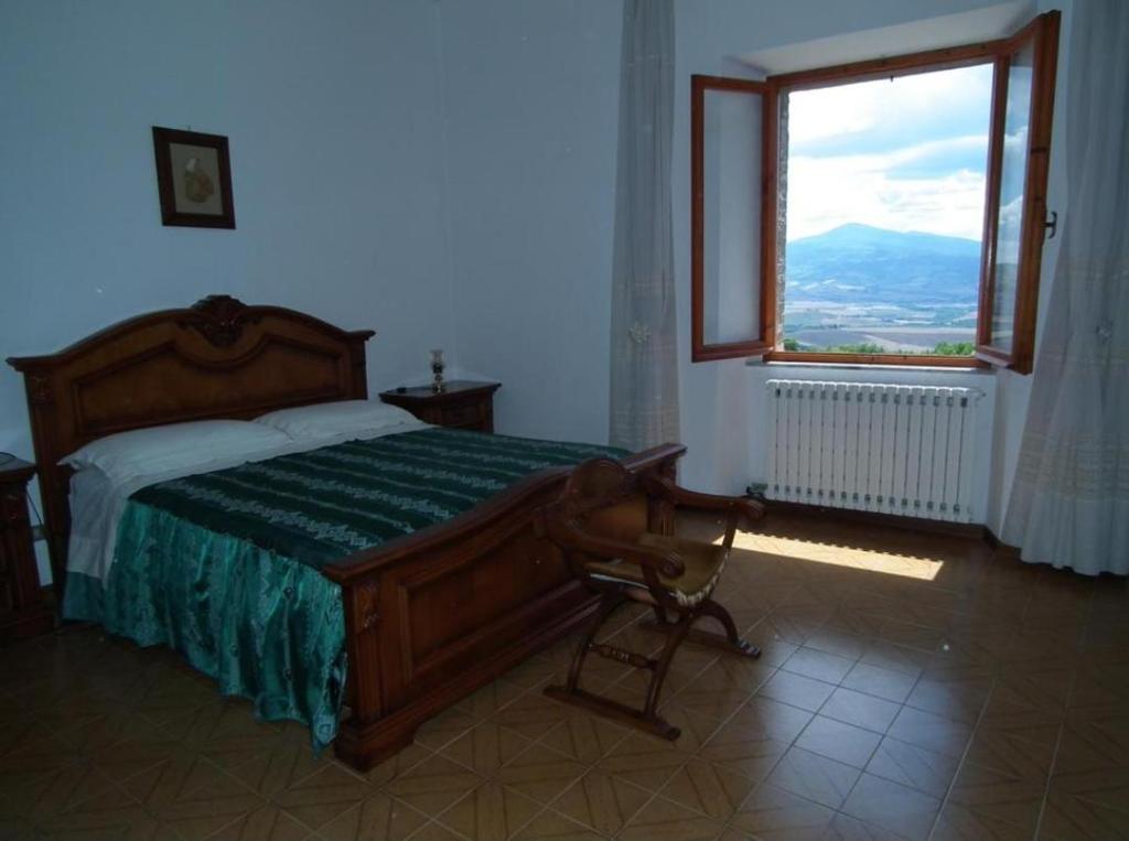 Posteľ alebo postele v izbe v ubytovaní Agriturismo Riposati