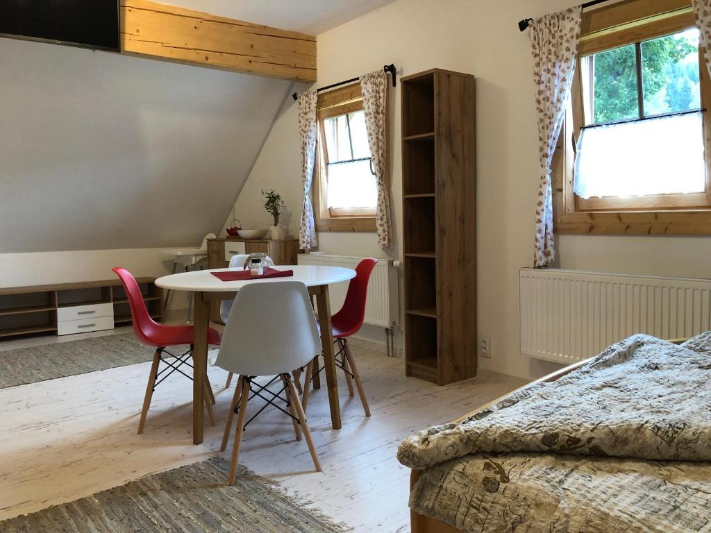 Postel nebo postele na pokoji v ubytování Apartmán U Setra