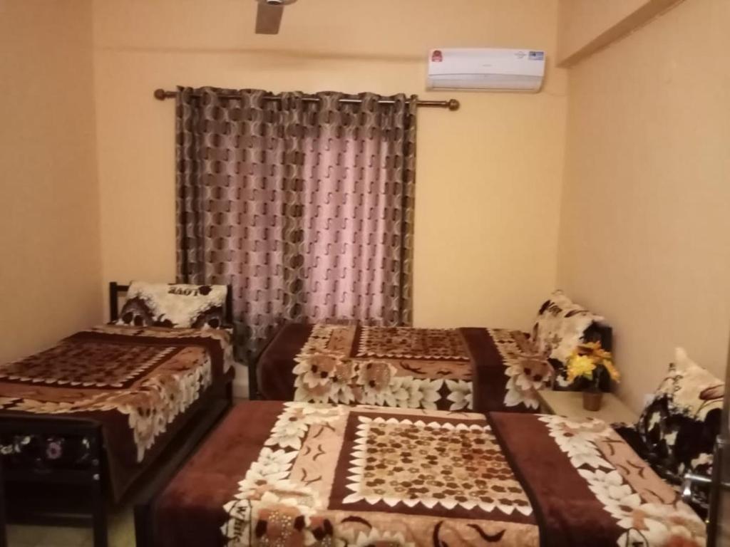 Postel nebo postele na pokoji v ubytování Cliff Hostel