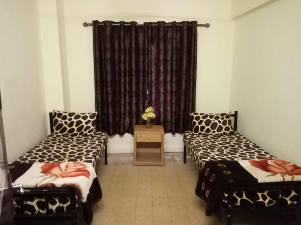 Postel nebo postele na pokoji v ubytování Cliff Hostel