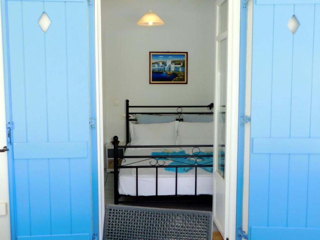 Posteľ alebo postele v izbe v ubytovaní Thalia Apartment