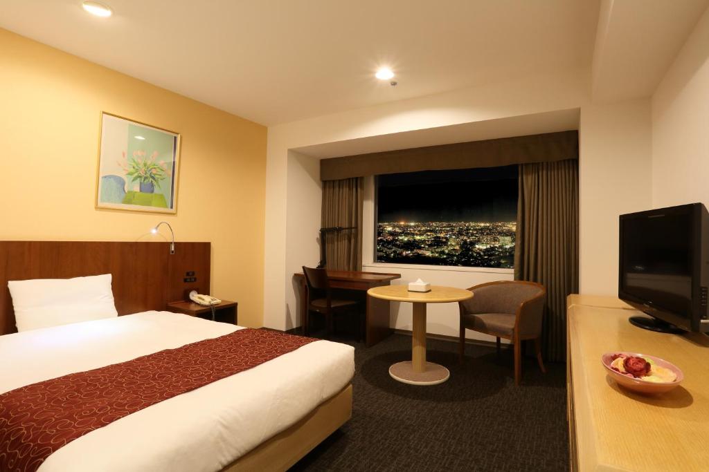 TV a/nebo společenská místnost v ubytování Loisir Hotel Toyohashi