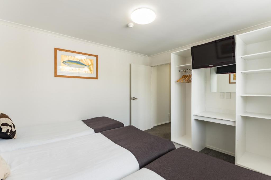 Postel nebo postele na pokoji v ubytování Anchorage Motel