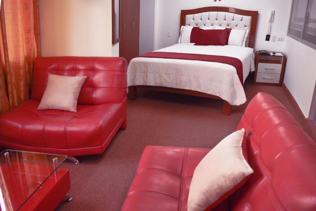 Postel nebo postele na pokoji v ubytování Hotel Wayra