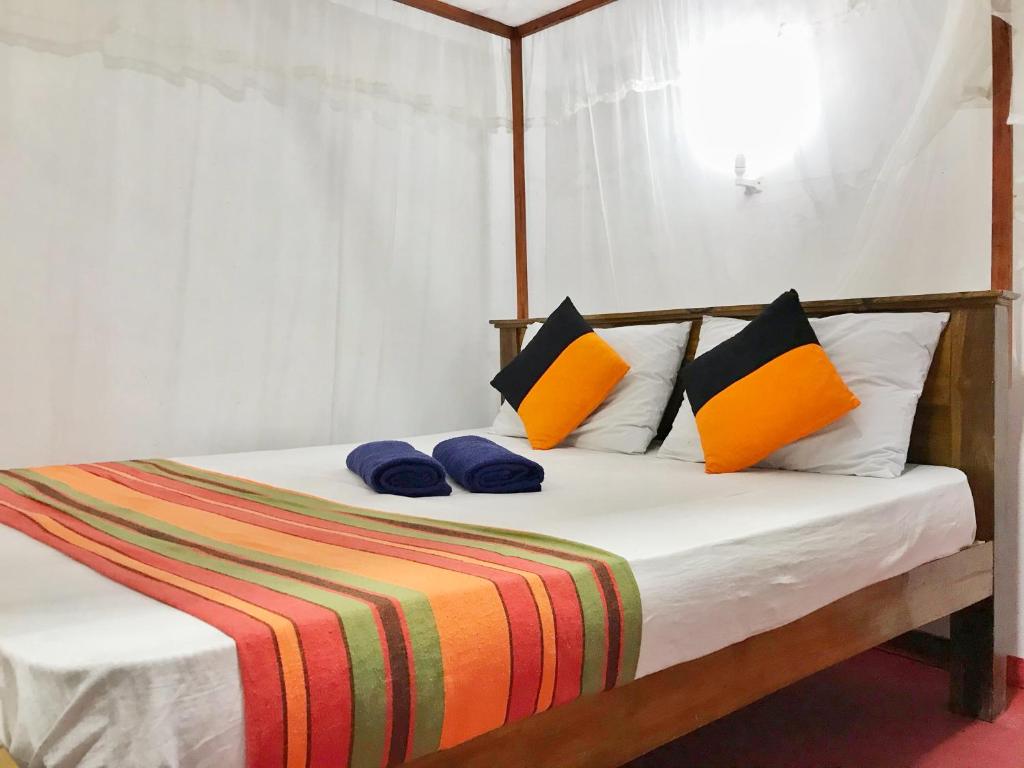 Postel nebo postele na pokoji v ubytování Double G Motel
