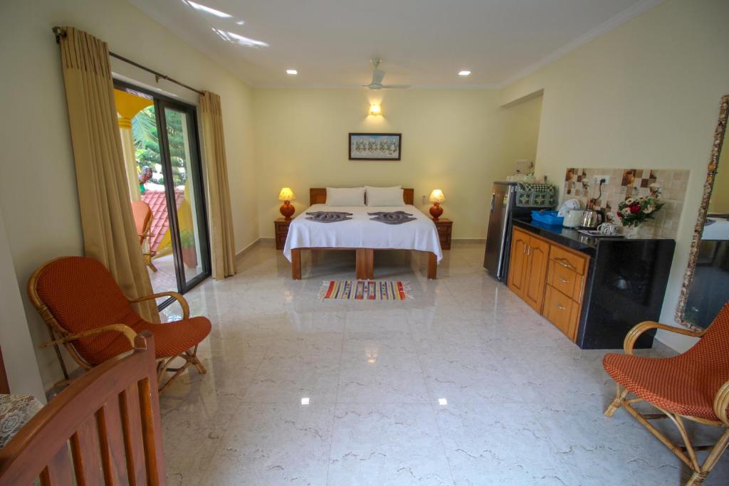 Kuchyň nebo kuchyňský kout v ubytování Primavera Holiday Homes-FAMILY RUN GOAN GUEST HOUSE