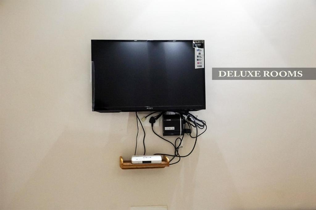 TV a/nebo společenská místnost v ubytování Pritams Cottages Guest House