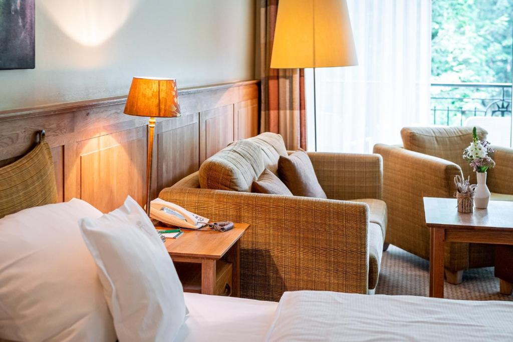 Postel nebo postele na pokoji v ubytování Waldhotel Tannenhäuschen