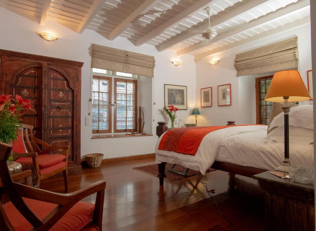Postel nebo postele na pokoji v ubytování Le Colonial 1506 - Exclusive Luxury Hideaway