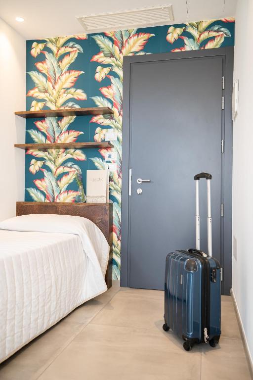 Postel nebo postele na pokoji v ubytování Hotel Abc